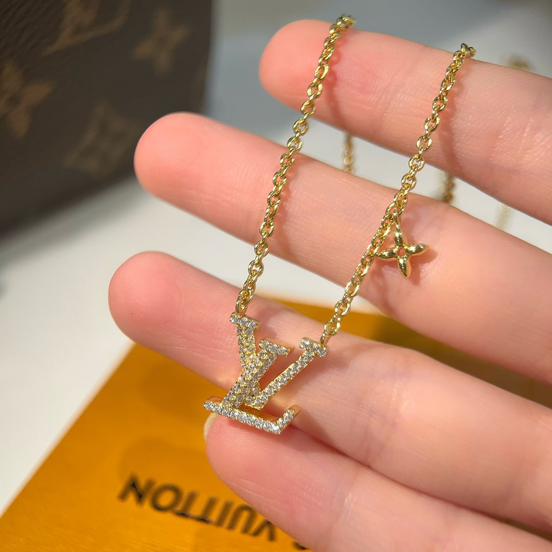 Louis Vuitton V necklace. | Necklace, Pendant necklace, Louis vuitton